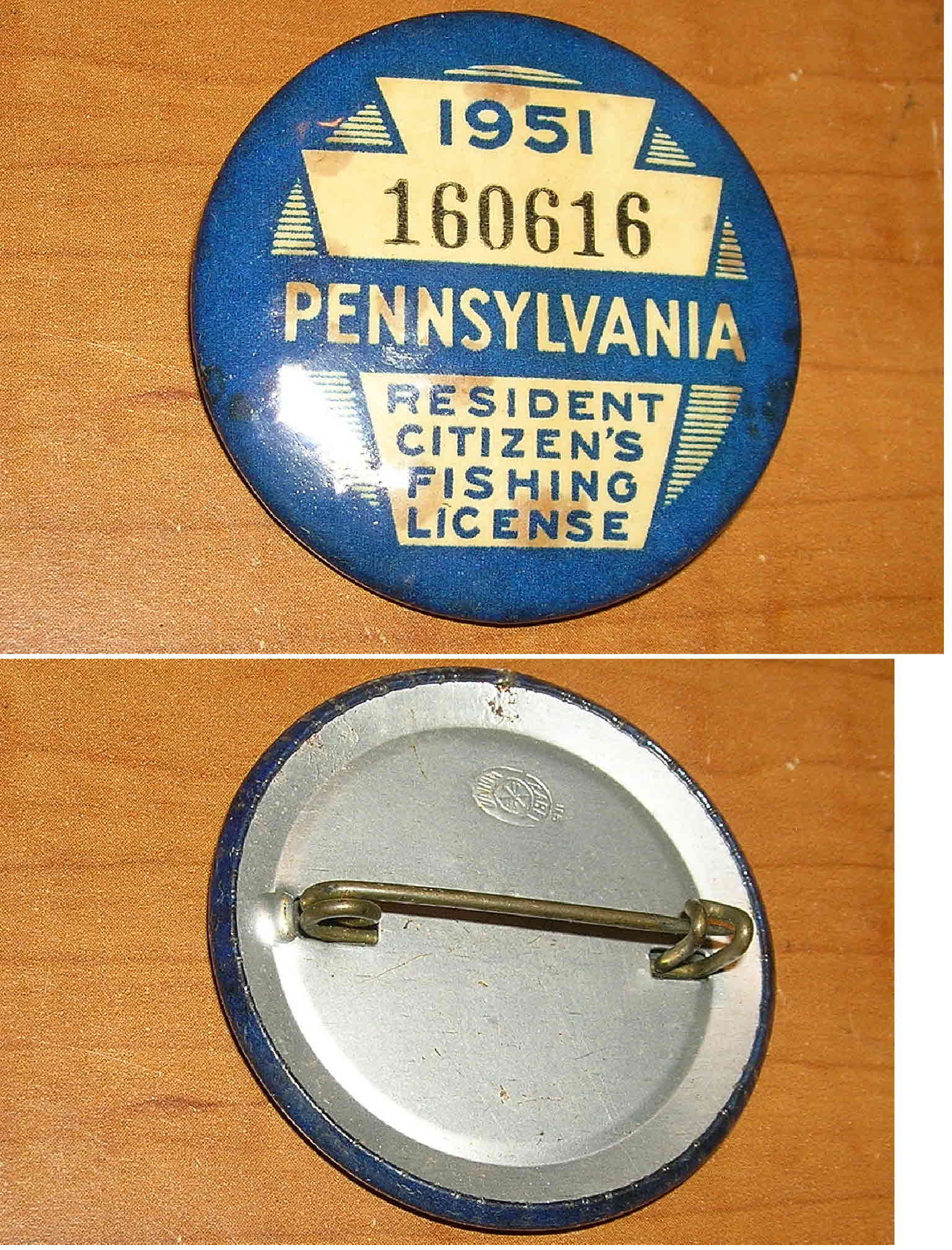 Display board with PA Resident fishing licenses 1923, 1925-1959, 1923-1997,  75-years button, 1974 & 1975 buttons